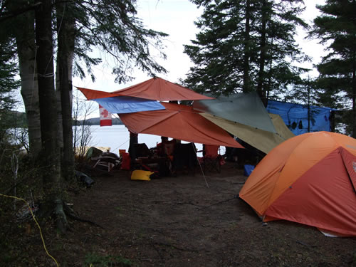 Tarp collection around the firepit.