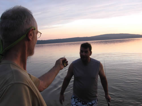 John shows an amazed Markus the bent hook.