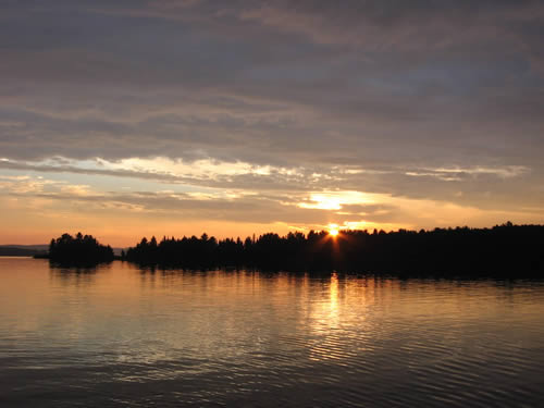 Sunset behind a nearby island.