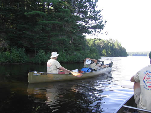 John says, "I don't know what all the fuss about canoeing is for."