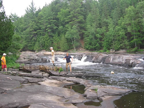 Exploring the strech of rapids.