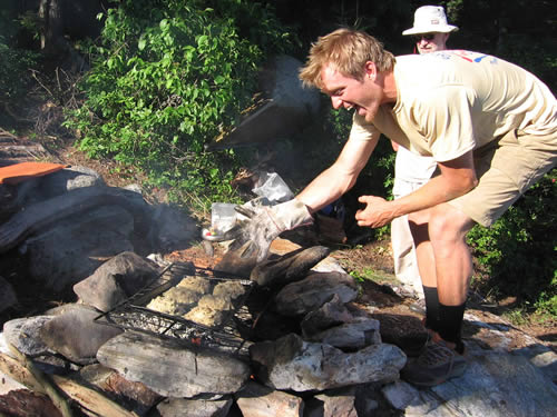 Jim gets dinner under control.