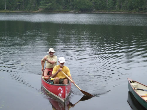 John and MarkS coming ashore at a portage.