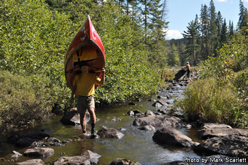 Pushing on, creek portage.