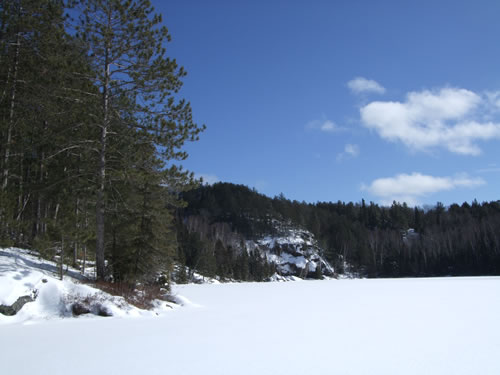 Cliffscape shoreline of Pinetree Lake.