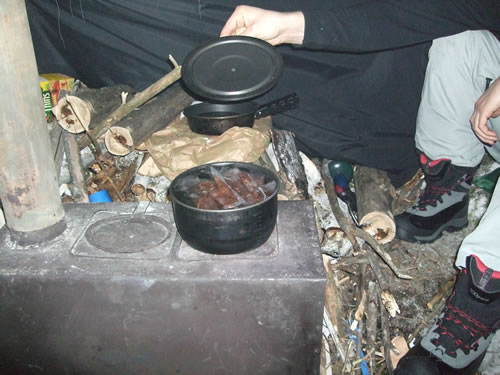 Brandon cooking up our roast beef dinner.