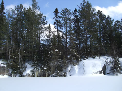 More Pinetree Lake rocky shoreline.