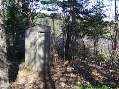 Outhouse at site, due to closeness of road.