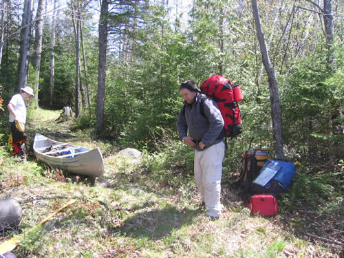 Preparing for the straight up portage.