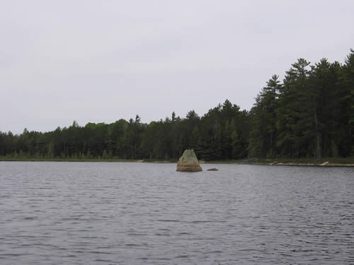 Pyramid shaped rock on May Lake.